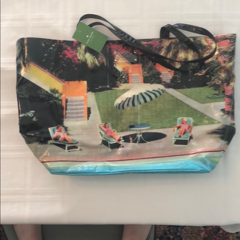 Kate Spade “daycation” tote. Never used with tags!